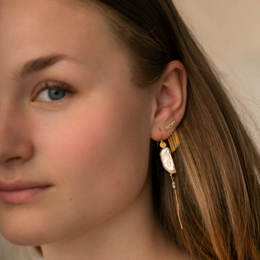 Dancing chains behind ear earring